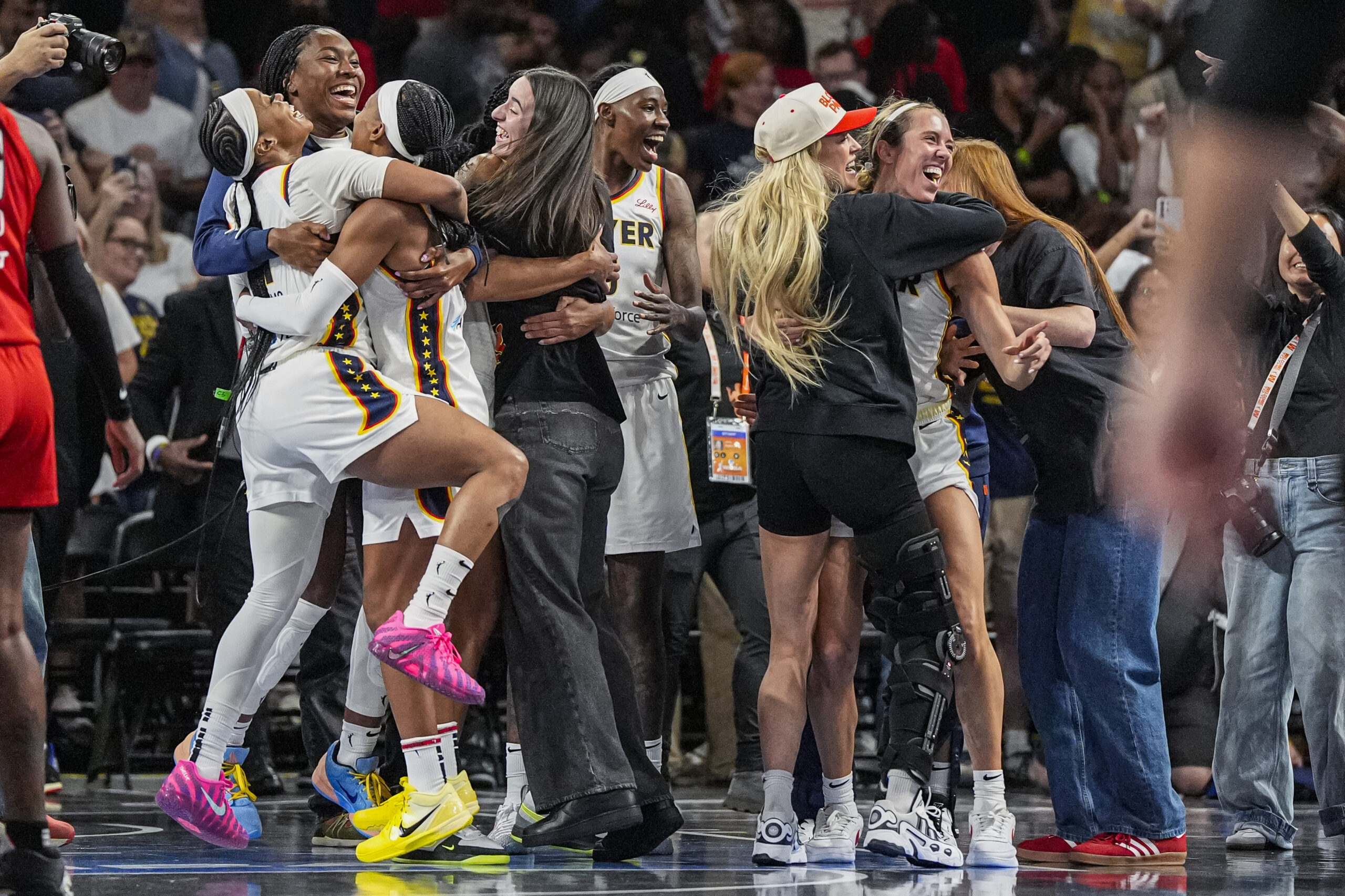 Indiana Fever players celebrate a series victory vs the Atlanta Dream