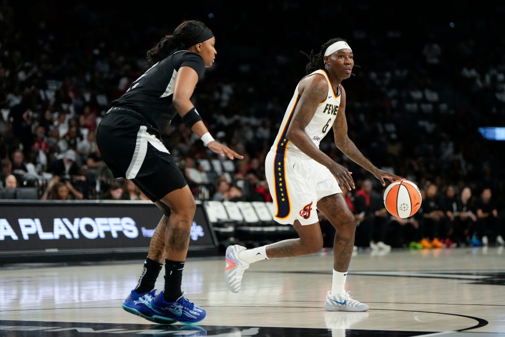 Natasha Howard with ball in Game 2 of 2025 WNBA playoffs Indiana Fever vs Las Vegas Aces