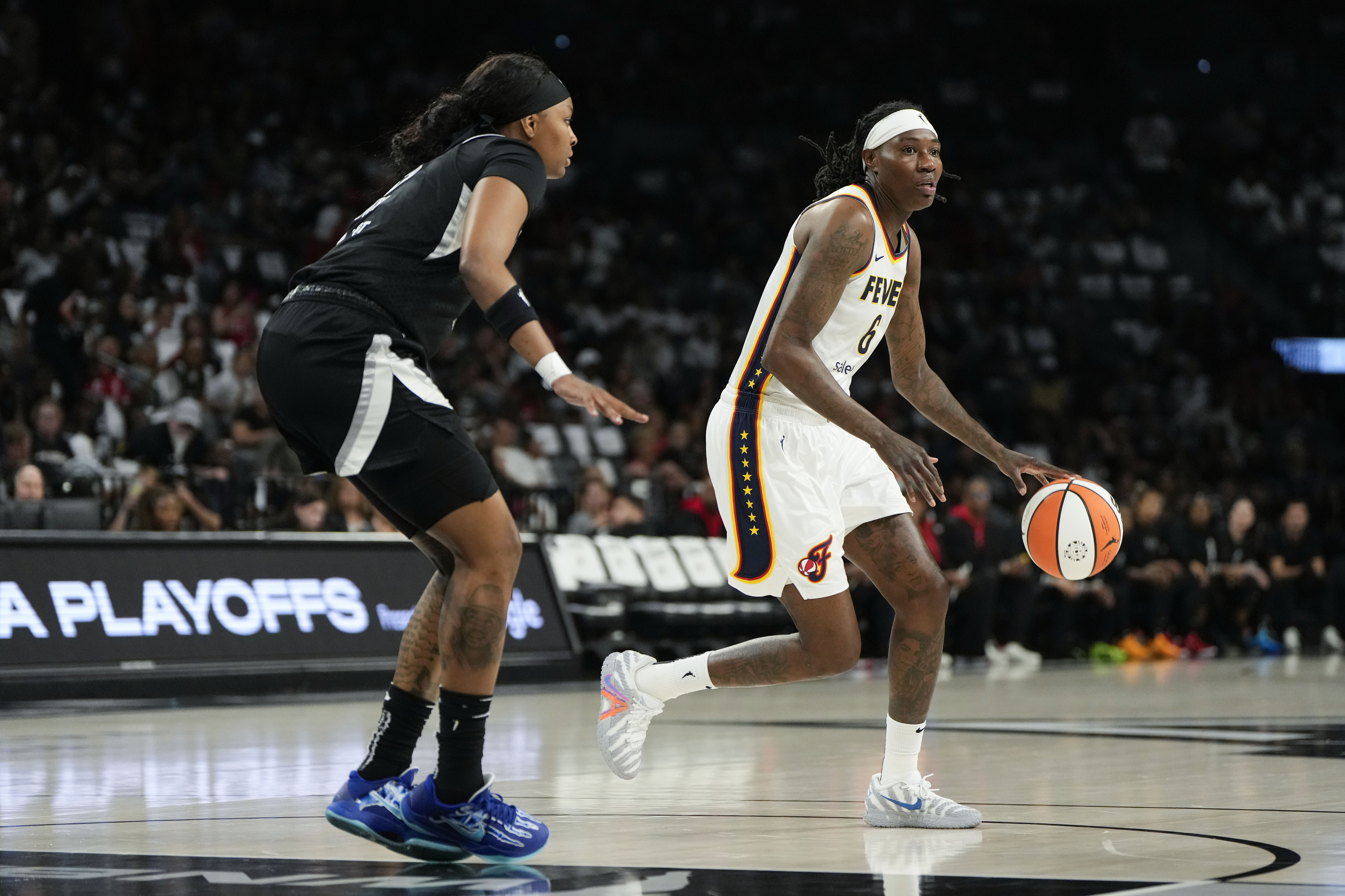 Natasha Howard with ball in Game 2 of 2025 WNBA playoffs Indiana Fever vs Las Vegas Aces