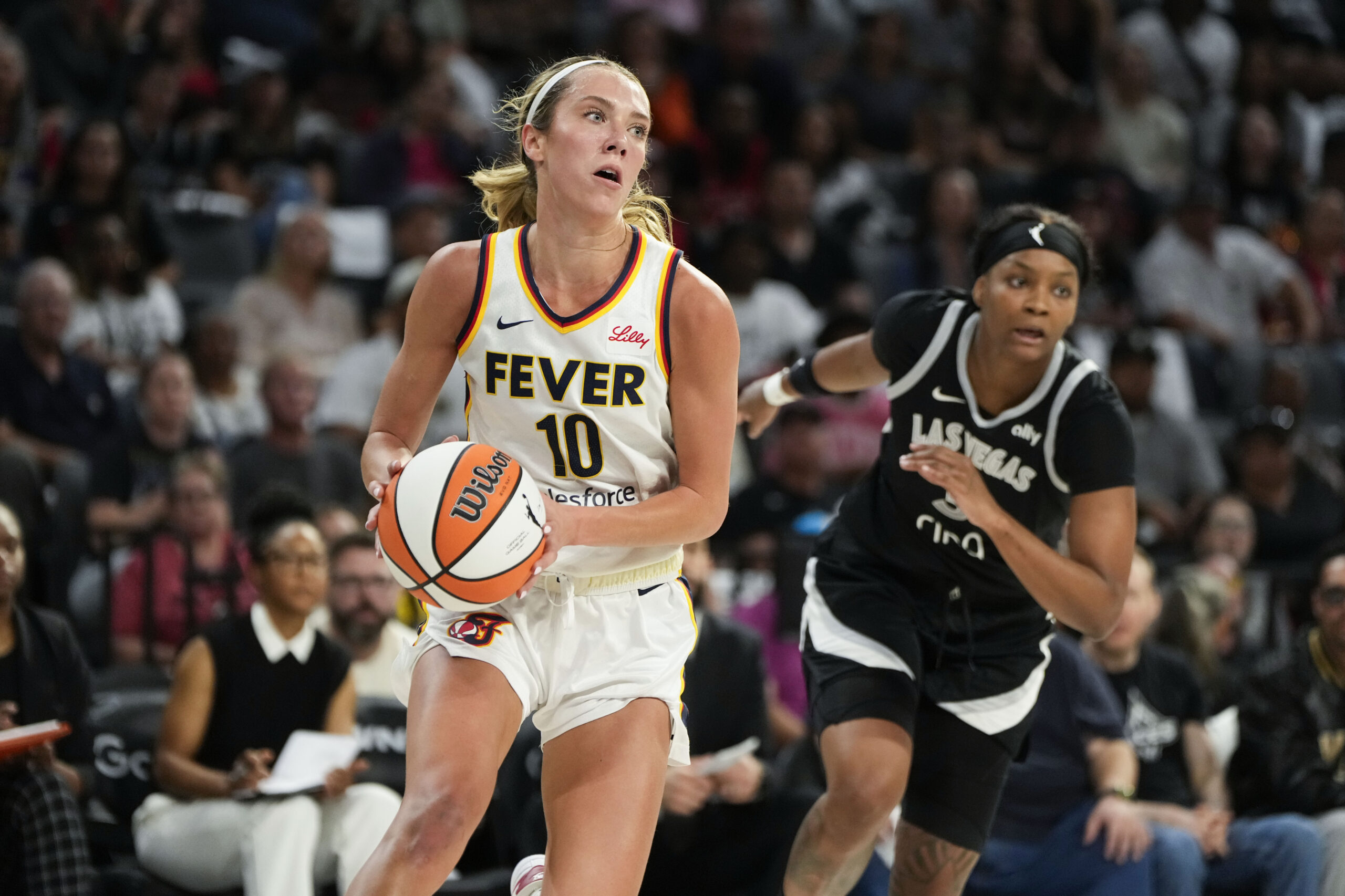 Lexie Hull with ball in Game 2 of 2025 WNBA playoffs Indiana Fever vs Las Vegas Aces