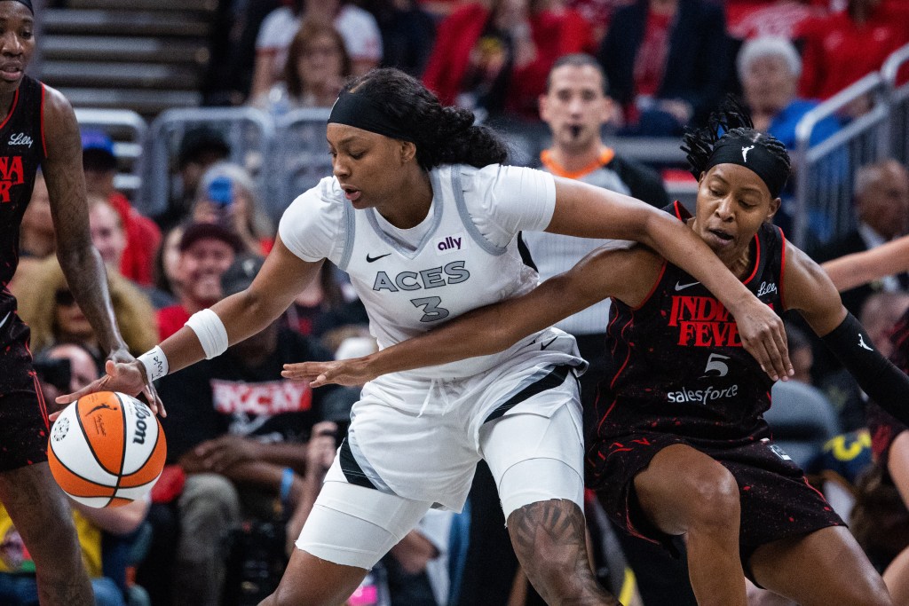Indiana Fever guard Shey Peddy defends Las Vegas Aces forward NaLyssa Smith
