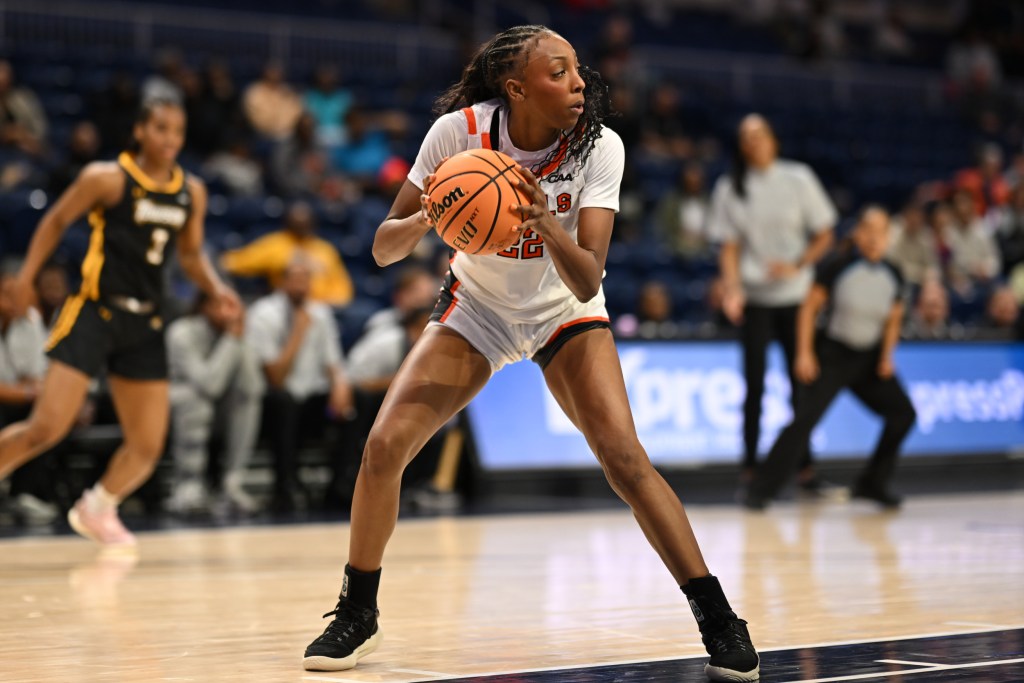 Campbell's Gianni Boone secures a rebound in a game against Towson in the CAA tournament.