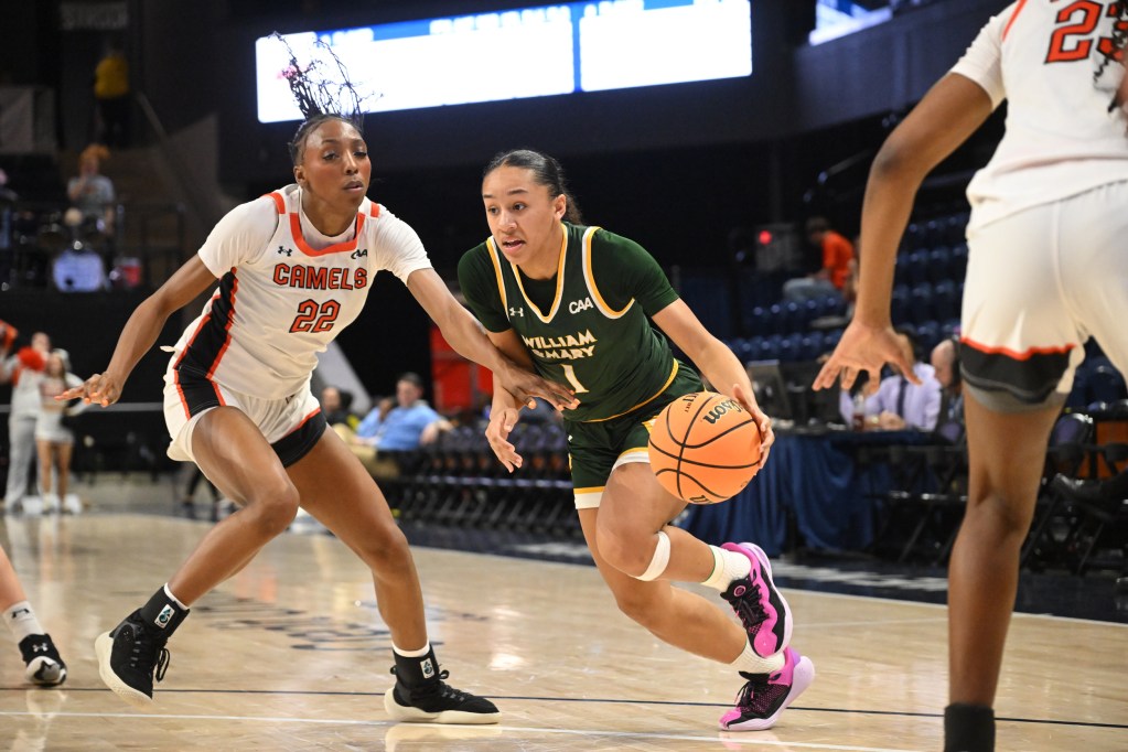 William & Mary guard Cassidy Geddes drives to the basket against Campbell's Gianni Boone.
