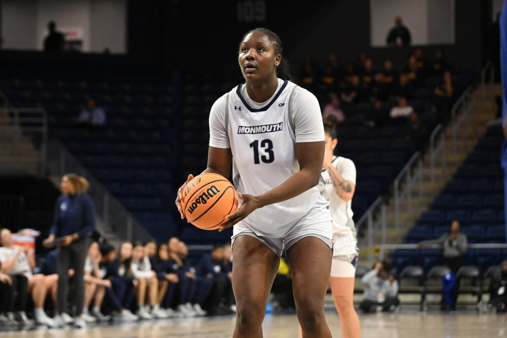 Monmouth's Divine Dibula prepares to shoot a free-throw during the CAA tournament.