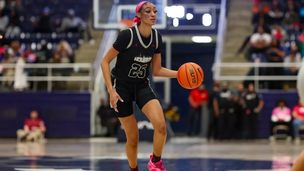 Howard's Nile Miller brings the ball up the floor and looks for a teammate to pass the ball to.