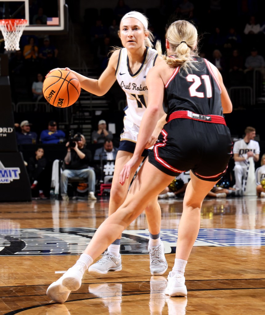 Oral Roberts' guard Jalei Oglesby looks to score on her opponent in the 2025 Summit League tournament in Sioux Falls, SD.