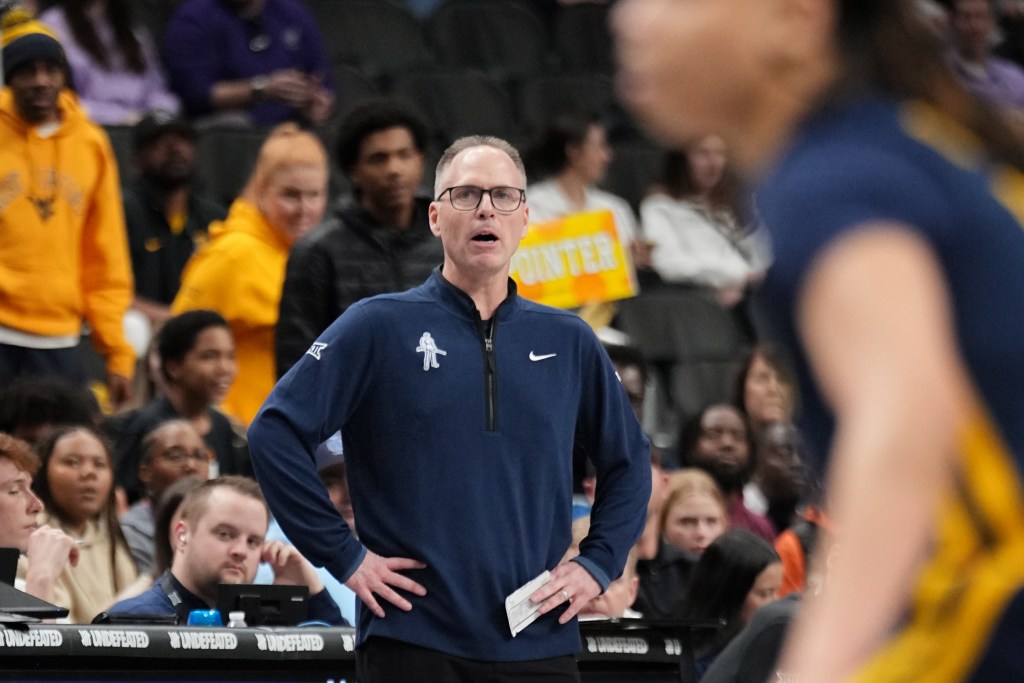 West Virginia head coach Mark Kellogg instructs his team during the 2025 Big 12 Tournament.