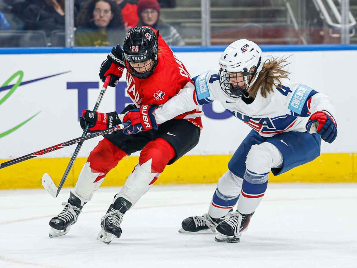 Emily Clark fights off Caroline Harvey