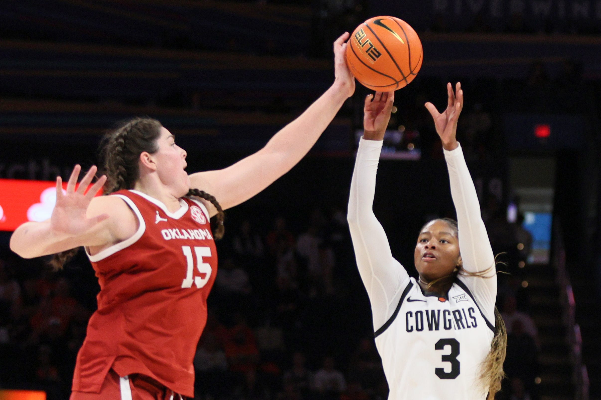 Reagan Beers of Oklahoma blocks the shot of an Oklahoma State player during their Dec. 13 game