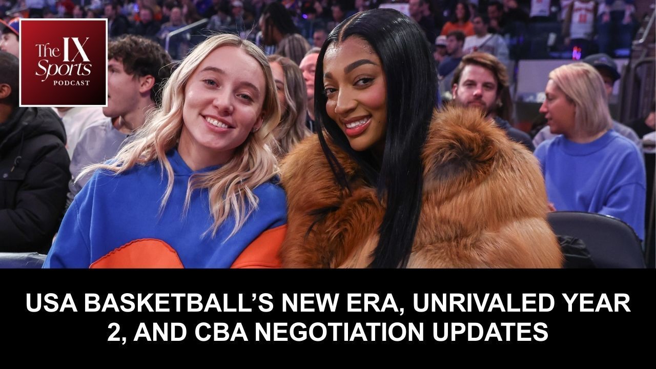 Paige Bueckers and Angel Reese are pictured courtside in street clothes, posing for a photo together