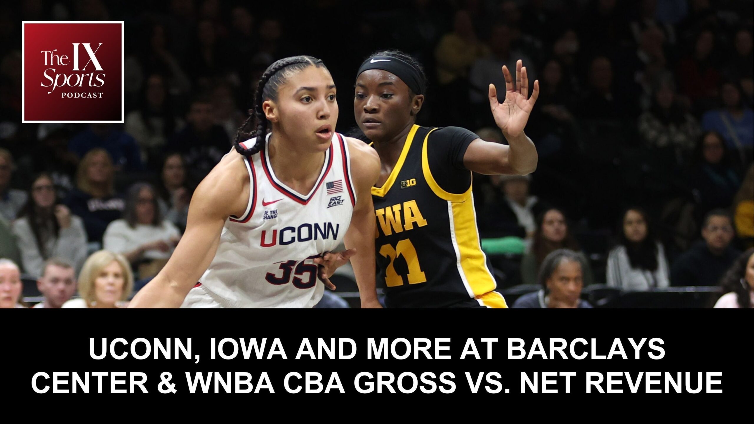 UConn's Azzi Fudd drives past an Iowa defender in the paint.