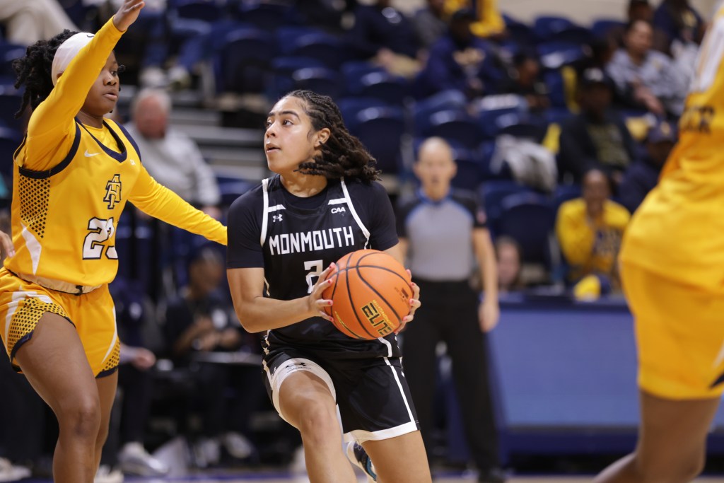 Monmouth's Gigi Gamble looks for room while being guarded by a defender from North Carolina A&T.