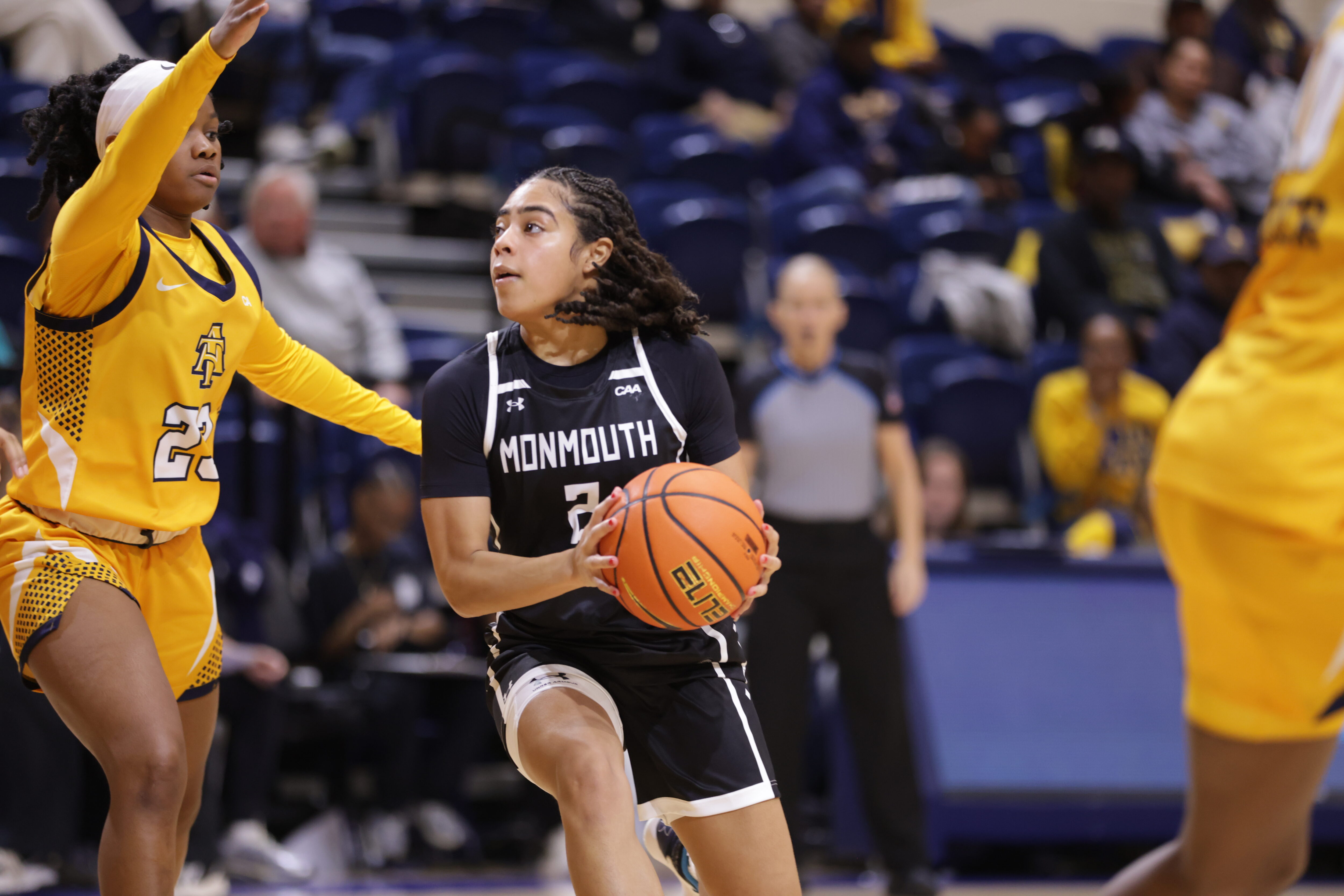 Monmouth's Gigi Gamble looks for room while being guarded by a defender from North Carolina A&T.