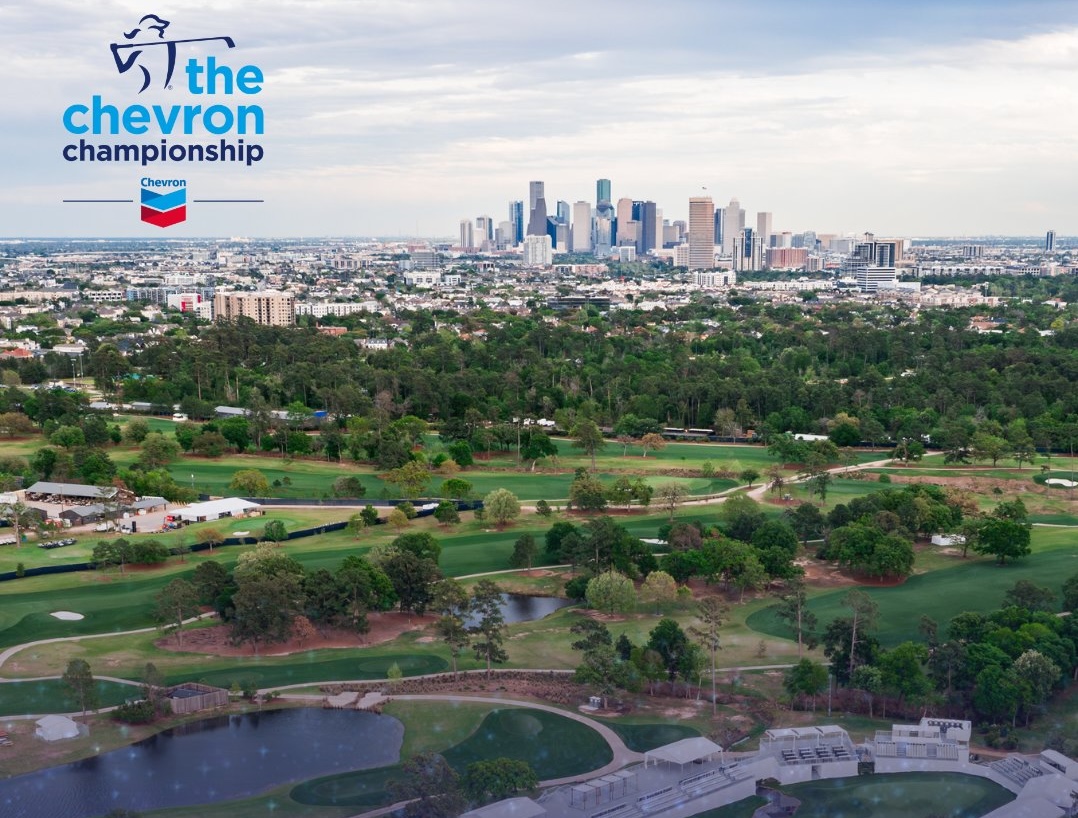 An aerial shot of Memorial Park Golf Course in Houston, Texas. The city skyline of Houston is visible at the horizon.