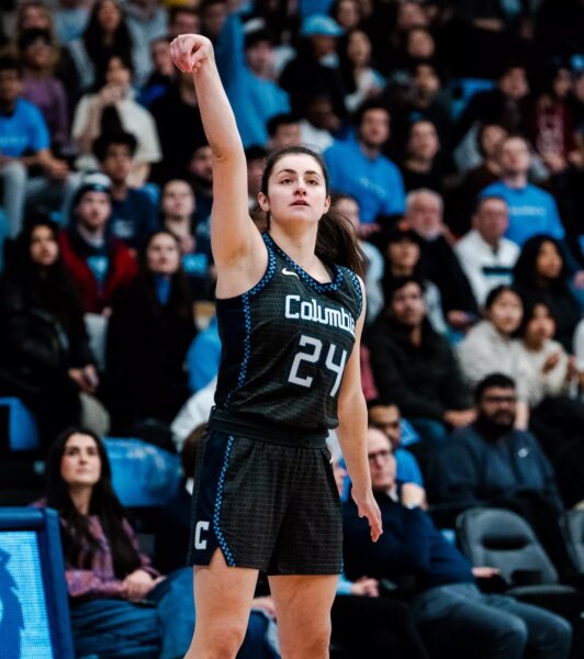 Columbia guard Riley Weiss holds her follow-through after shooting a right-handed jump shot.