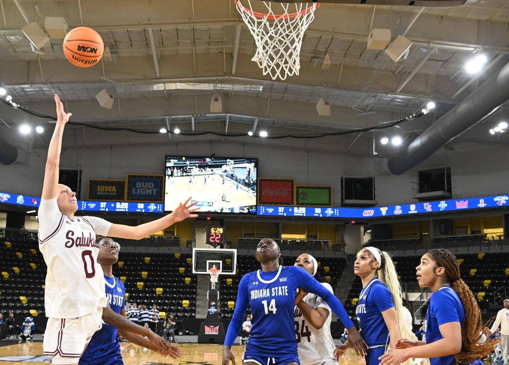 Southern Illinois guard drives to the basket for a left-handed layup
