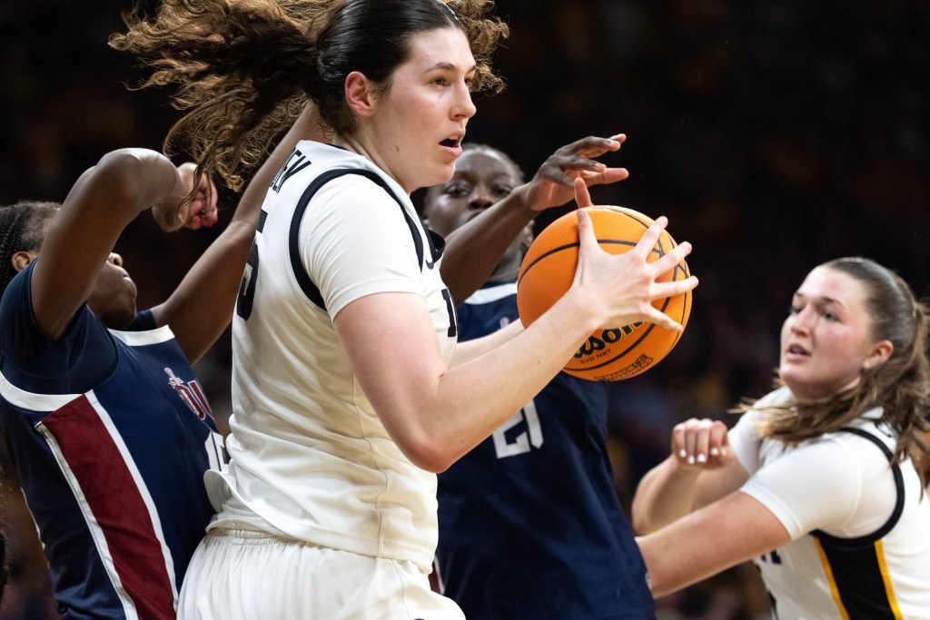 Iowa center Ava Heiden grabs one of her 7 rebounds against the Fairleigh Dickinson Knights during a First Round 2026 NCAA Tournament game at Carver-Hawkeye Arena in Iowa City, Iowa.
