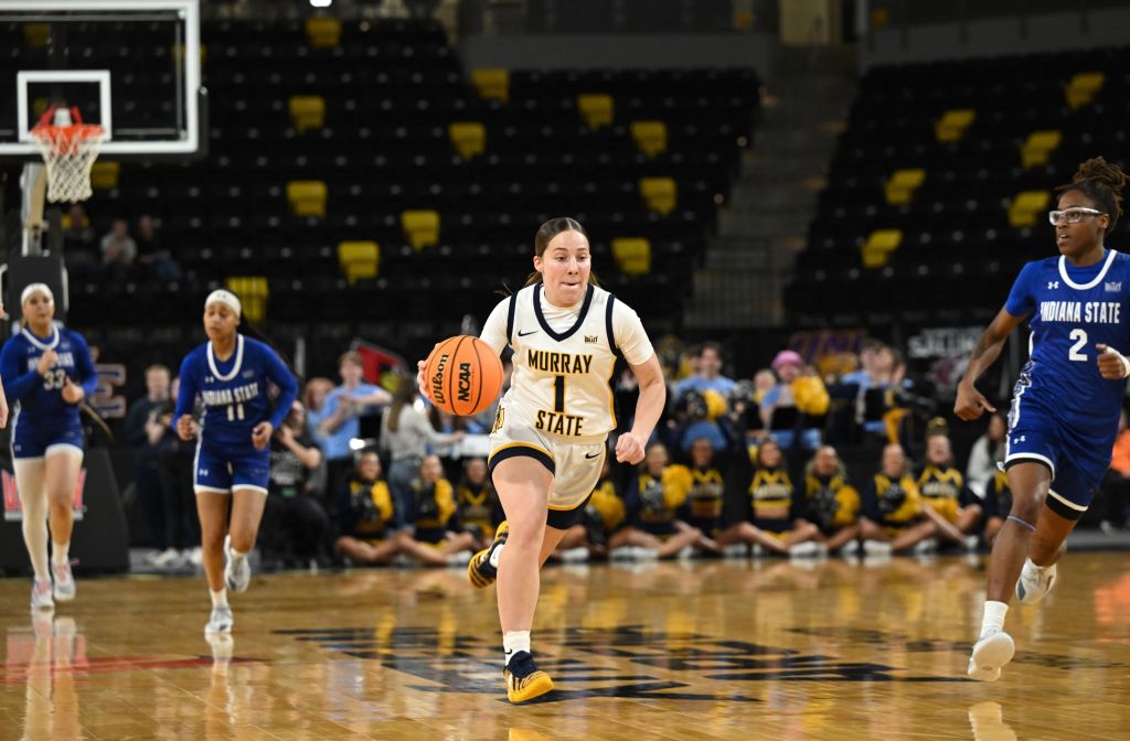 Murray State guard Hallie Poock (drives up the court in Murray State's win over Indiana State in the 2026 Missouri Valley Tournament.