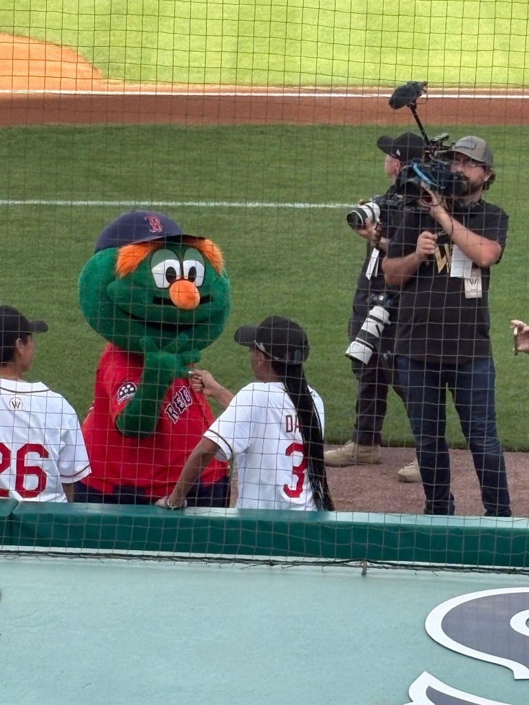 Mo'ne Davis and Wally the Green Monster.