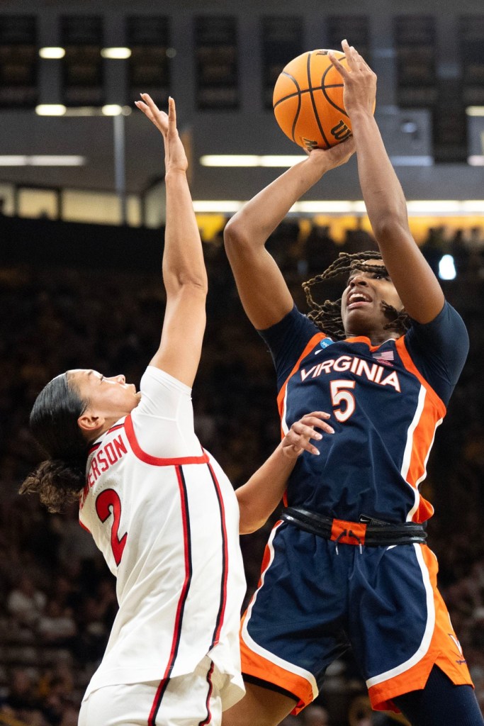Virginia forward Sa’Myah Smith shoots over Georgia guard Savannah Henderson during a First Round 2026 NCAA Tournament game at Carver-Hawkeye Arena in Iowa City, Iowa.