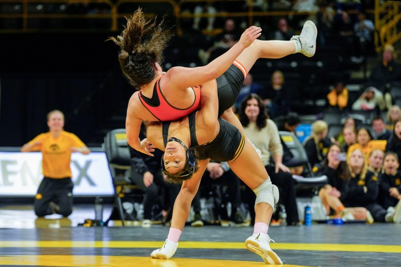 Iowa’s Kennedy Blades throws Oklahoma State’s Daniella Nugent during a 160-pound match Dec. 7, 2025 at Carver-Hawkeye Arena in Iowa City, Iowa.