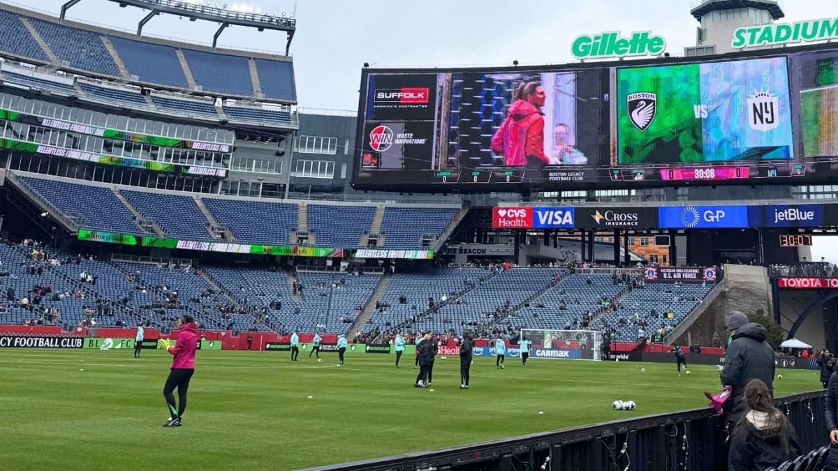A stadium fills up as soccer teams prepare to play