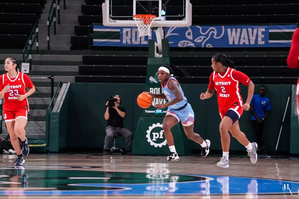Jermesha Frierson brings the ball up the floor for Delaware State.