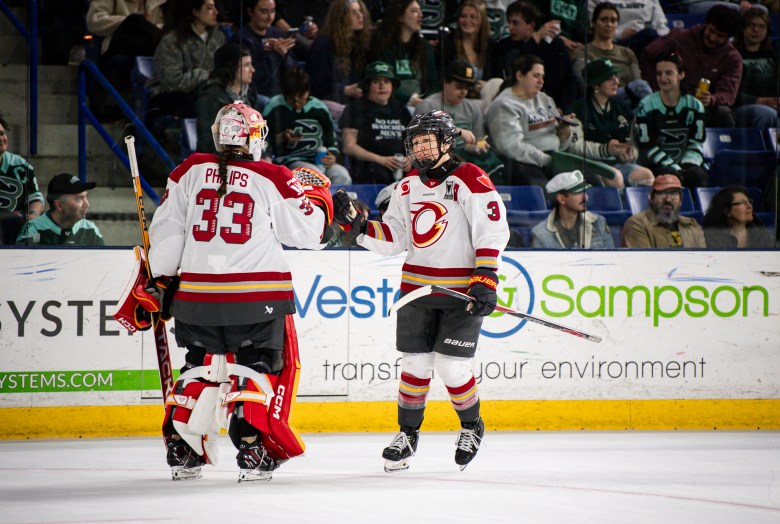 Members of the Ottawa Charge gather during a playoff game on April 30.