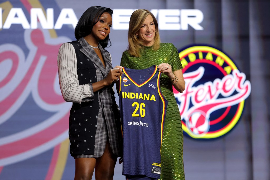Indiana Fever rookie guard Raven Johnson with WNBA Commissioner Cathy Emgelbert at the 2026 WNBA Draft.