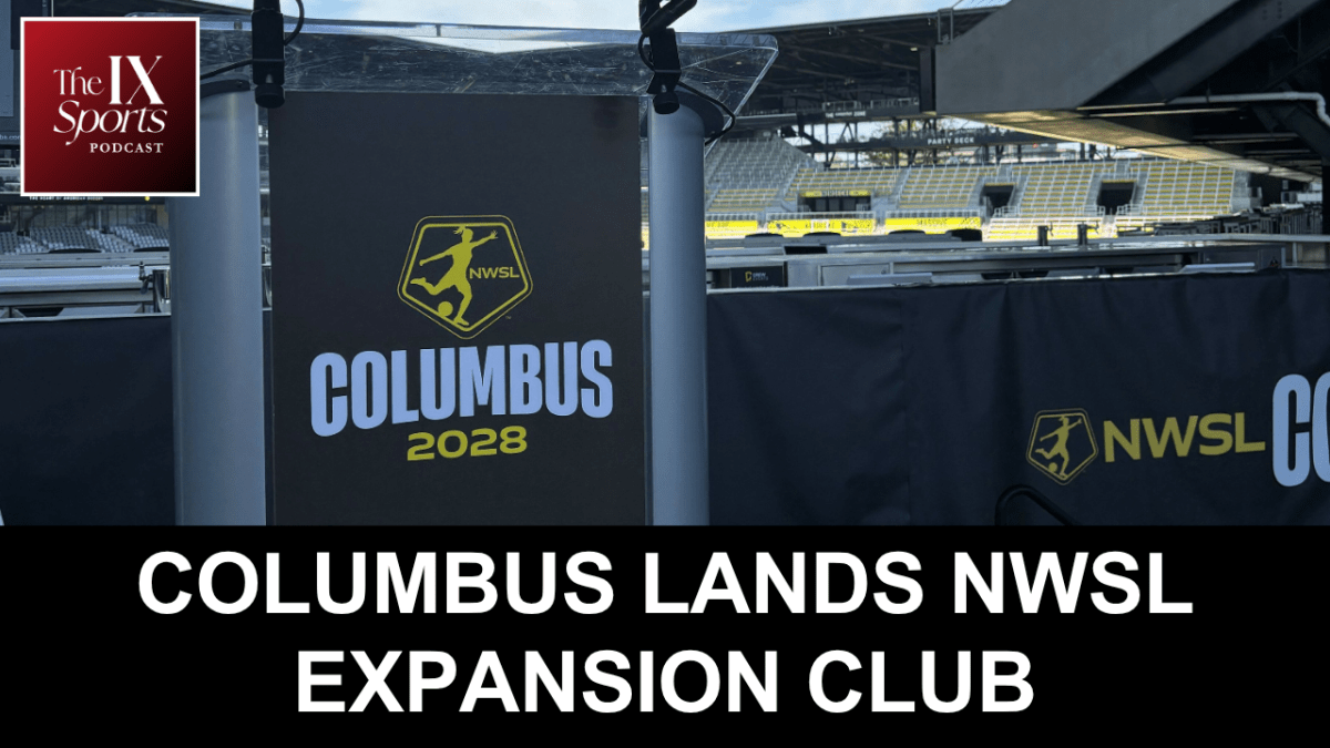 A banner in front of stadium shows the NWSL logo in yellow the word Columbus below it in white and the year 2028 below that in yellow.