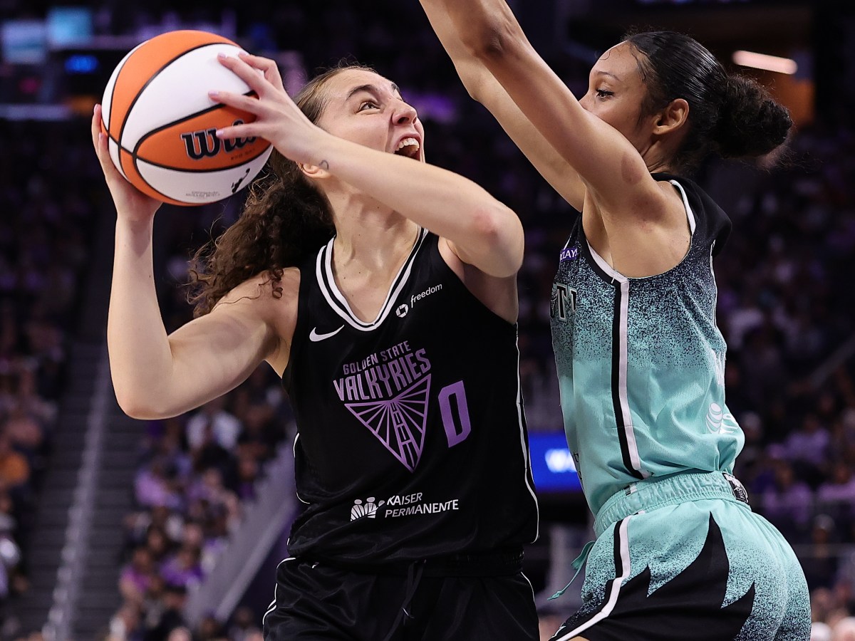 Valkyries guard Carla Leite puts a shot up against Chicago's Rebekah Gardner during the 2025 WNBA season.