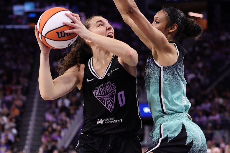Valkyries guard Carla Leite puts a shot up against Chicago's Rebekah Gardner during the 2025 WNBA season.