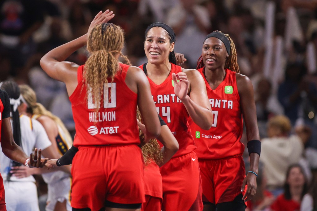 Four Atlanta Dream players in red jerseys, <a rel=