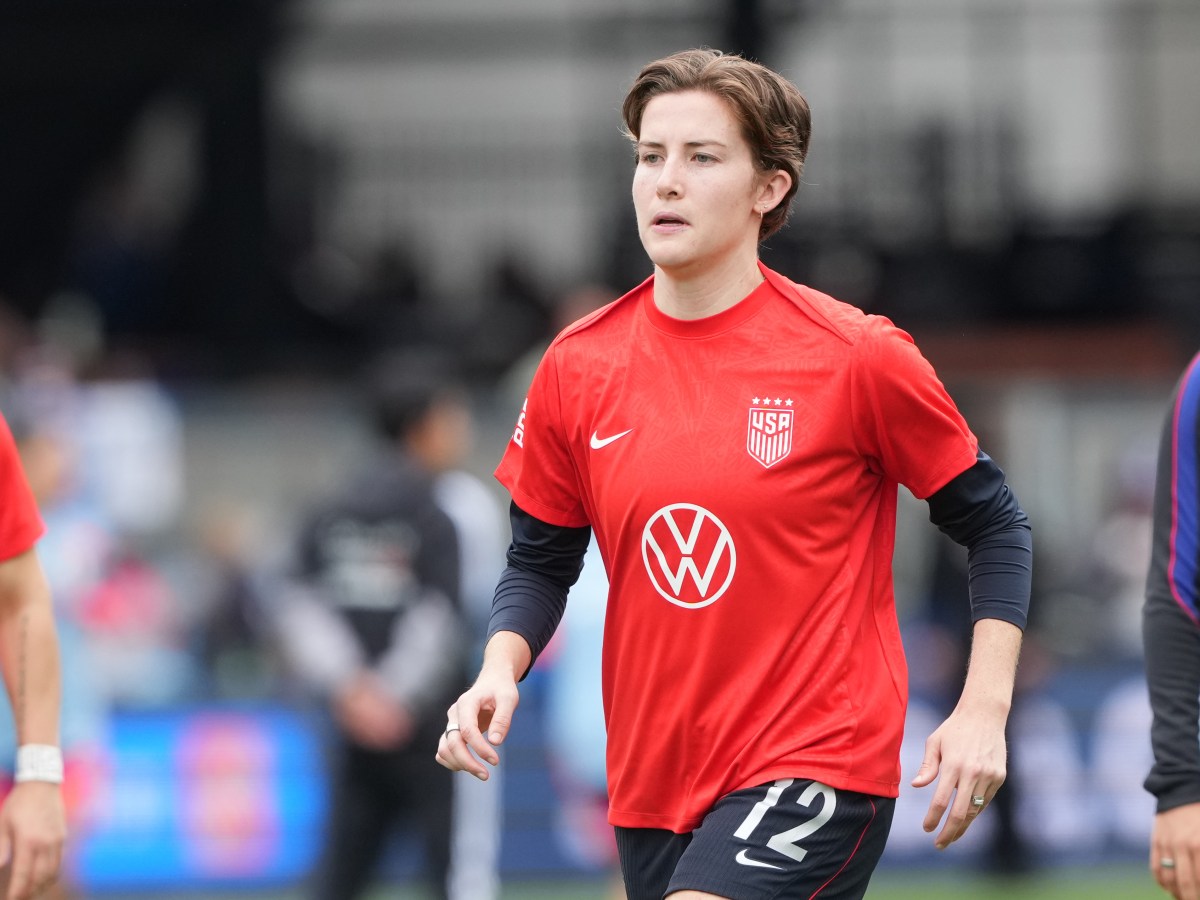 U.S. women's national team defender Tierna Davidson is shown on the field in a red warmup jersey