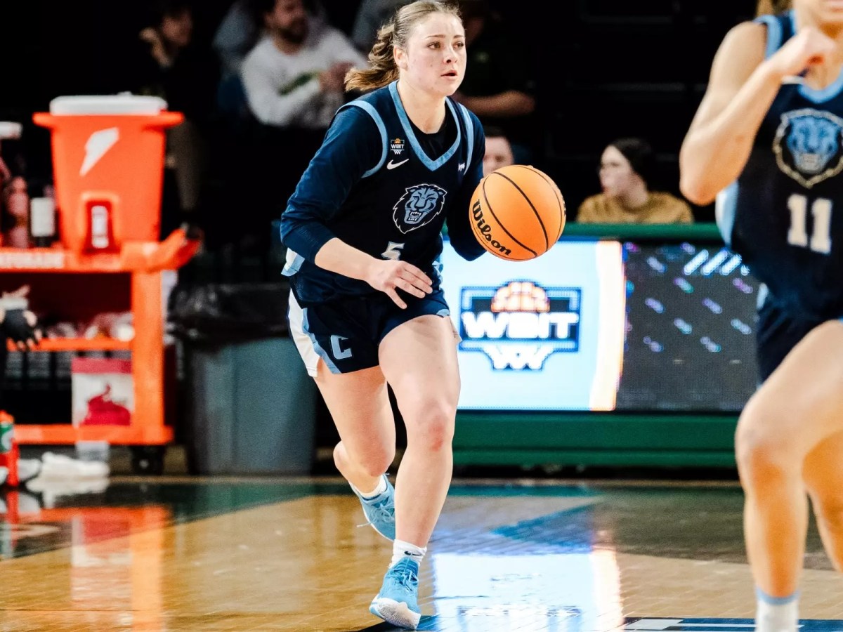 Columbia guard Mia Broom dribbles the ball with her left hand. Her eyes are up, looking ahead to her left.