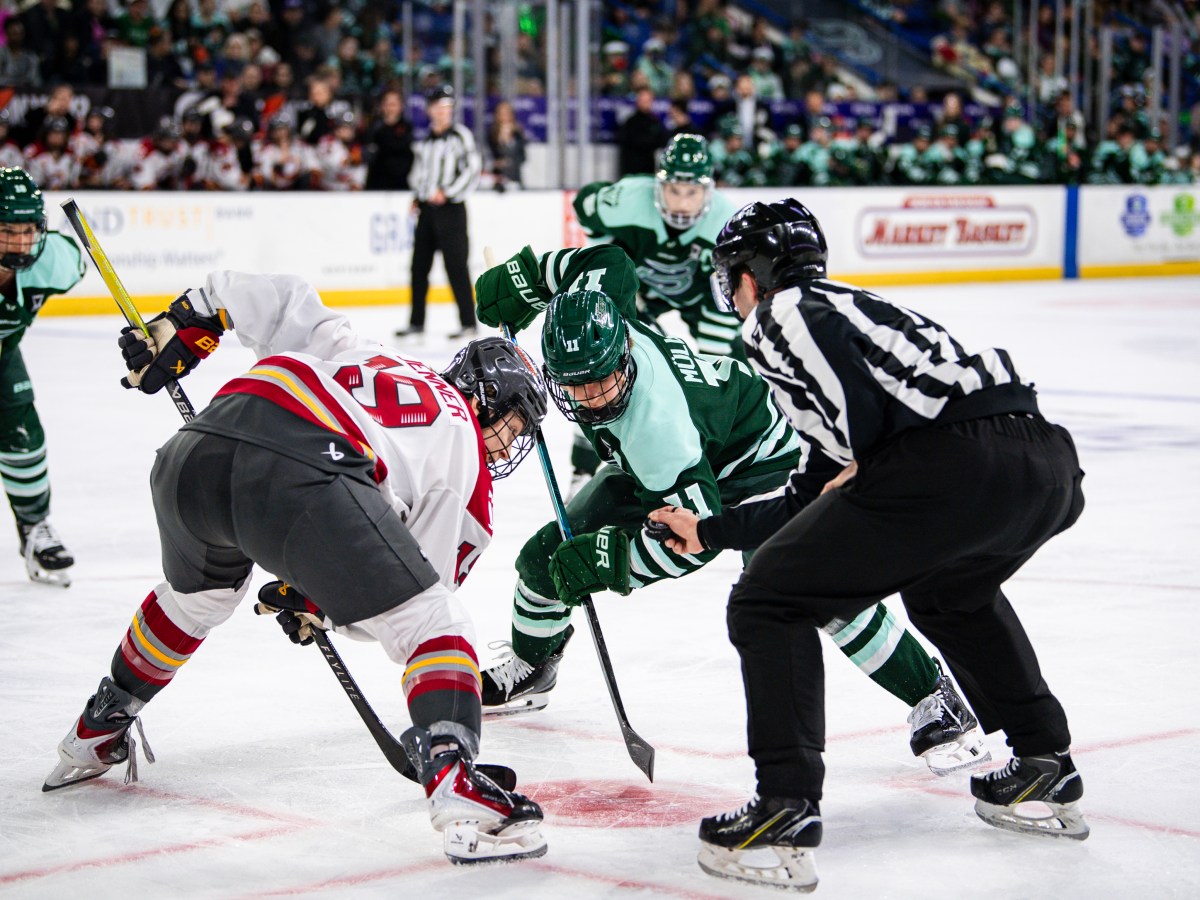 Brianne Jenner & Alina Muller line up for a faceoff in PWHL playoff action.