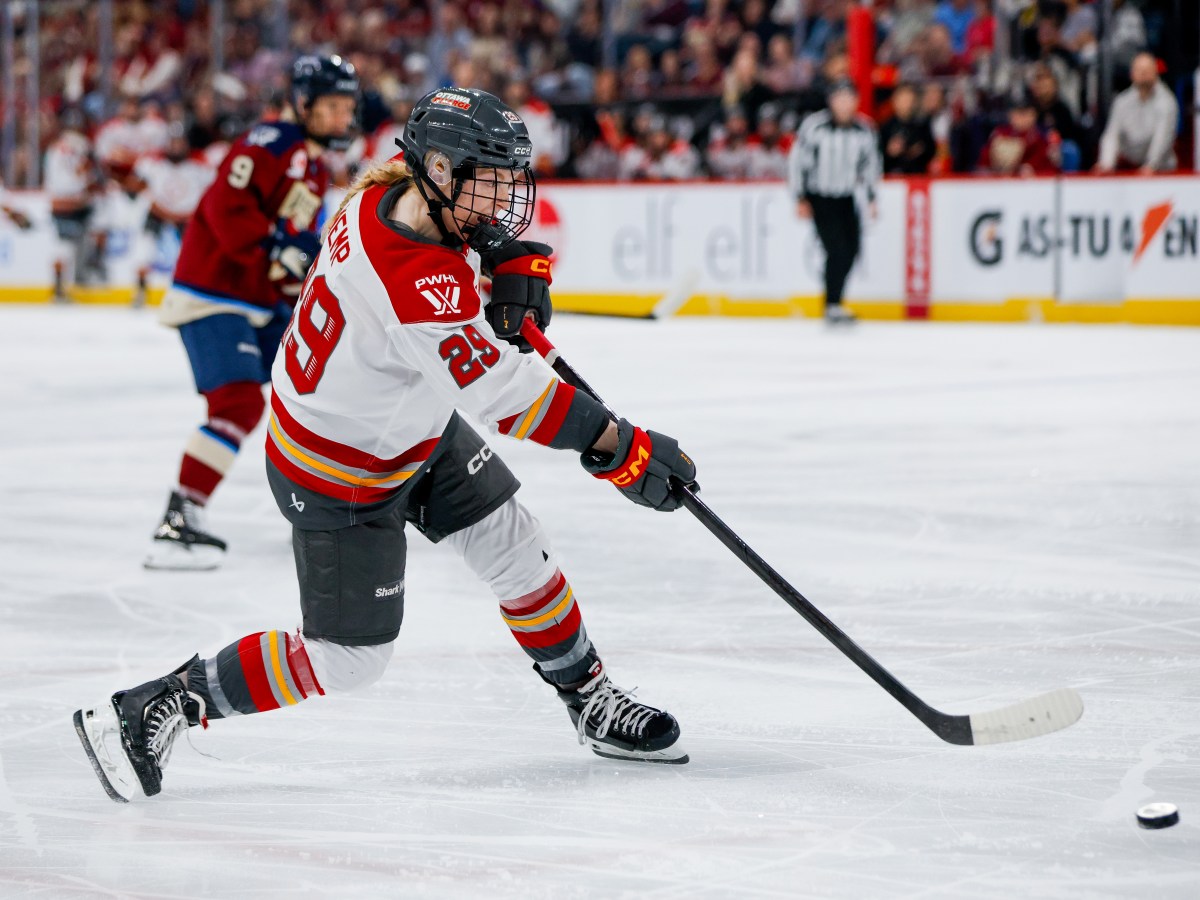 Peyton Hemp takes a shot in a PWHL game with the Ottawa Charge.