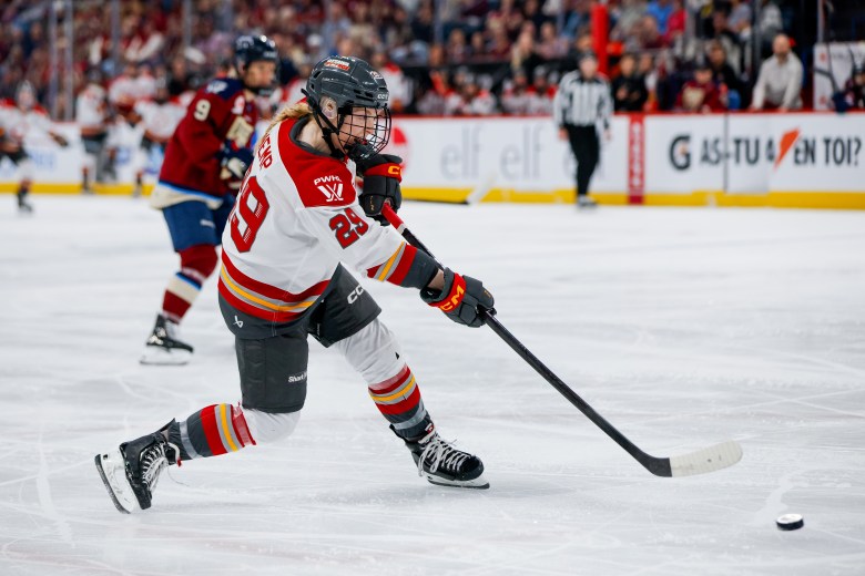 Peyton Hemp takes a shot in a PWHL game with the Ottawa Charge.