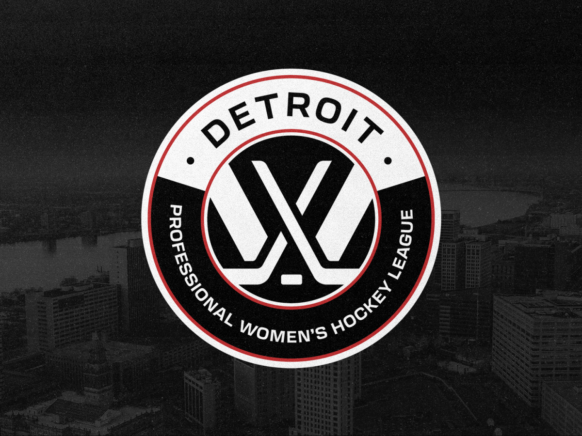 A black and white circle with red accents, with the words "Detroit" and "Professional Women's Hockey League" on the outer ring, and a white PWHL logo in the center.