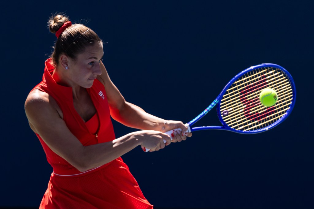 Marta Kostyuk hits a backhand at the 2025 U.S. Open