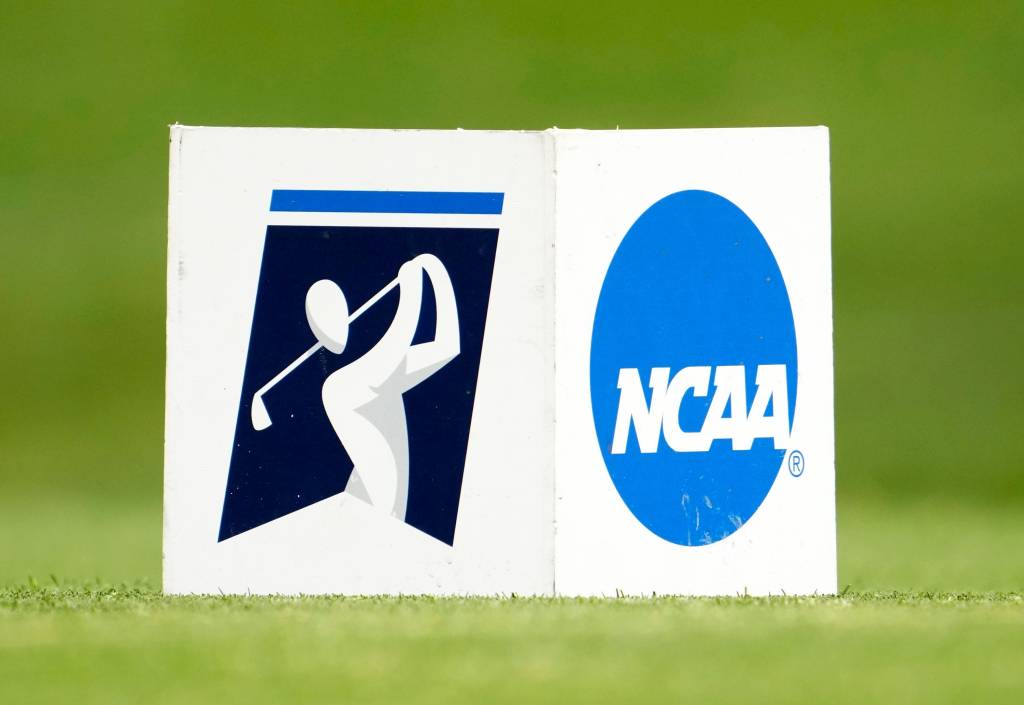 A white golf tee marker with the NCAA logo on the right side and the NCAA golf logo on the left.