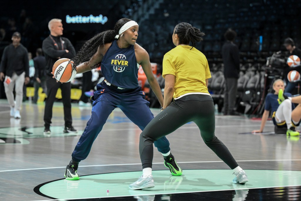Indiana Fever guard Raven Johnson warms up for a game against the New York Liberty.