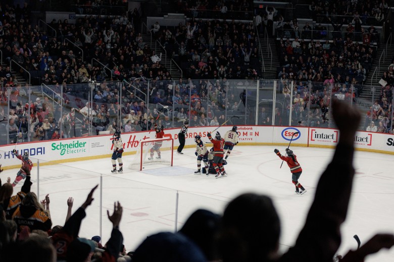 Ottawa Charge players & fans celebrate a goal.