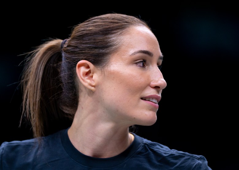Rebecca Allen's side profile as she smiles while turning her head