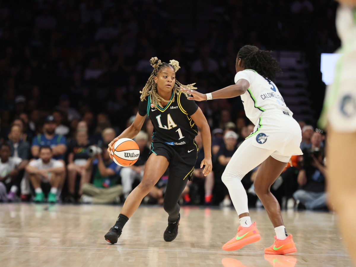 Monique Akoa Makani has dribbles with her right hand while being guarded by Maya Caldwell-Jones in the recent win over the Minnesota Lynx