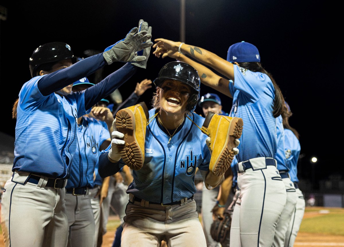 Denae Benites, Kelsie Whitmore trade home runs in rain-shortened Heights win
