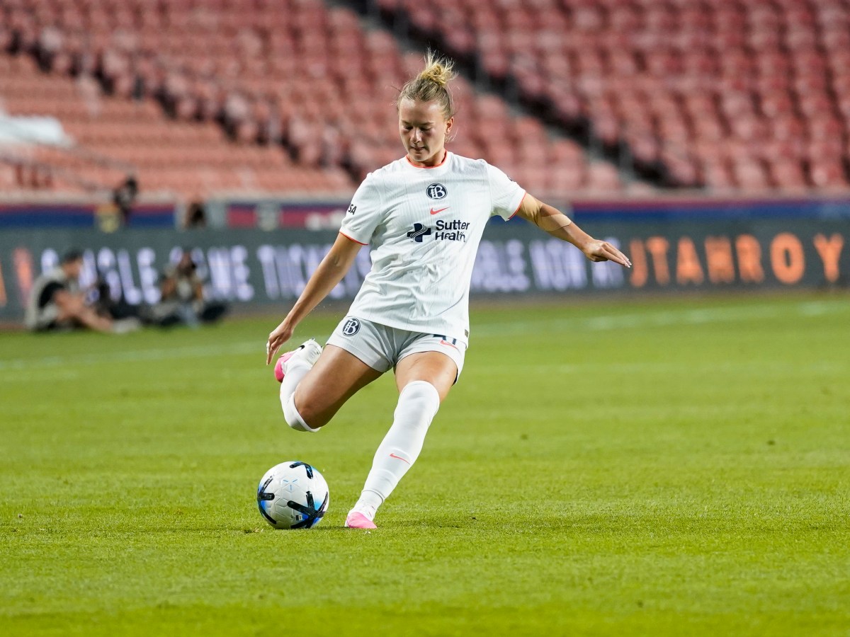 Kennedy Fuller prepares to take a free kick with her right foot.