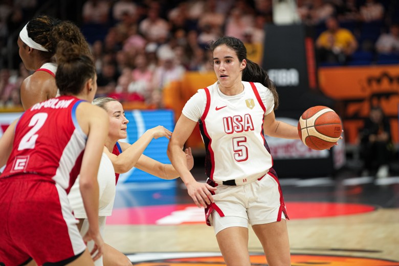 Team USA guard Sonia Citron dribbles the ball in her left hand while a Czechia player defends her.