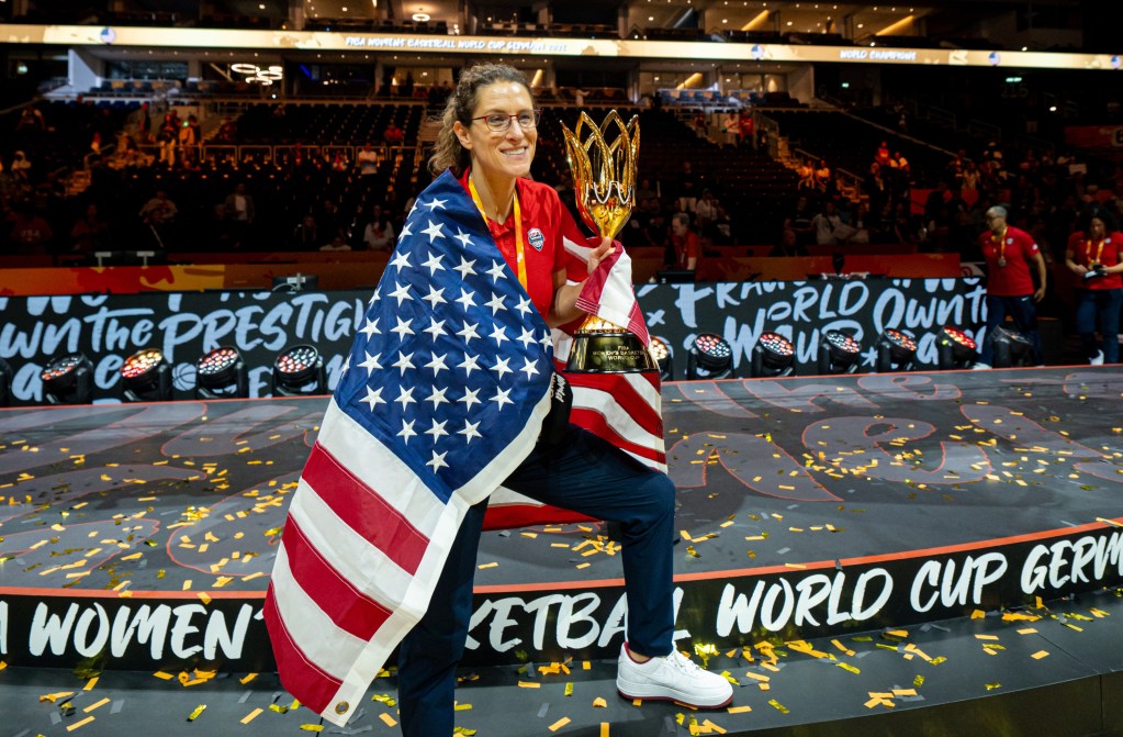 Indiana Fever head coach and Team USA assistant coach Stephanie White poses with a trophy after Team USA won the 2026 WIBA Women's Basketball World Cup.