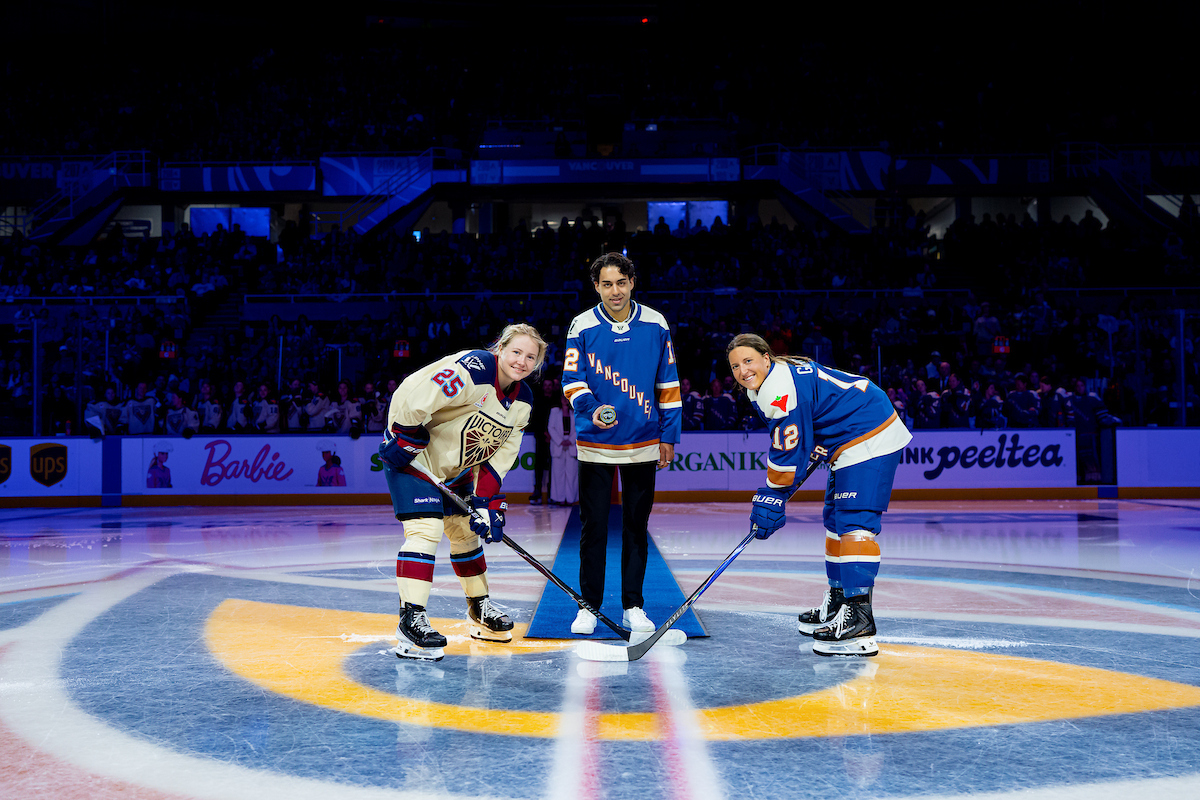 Ceremonial faceoff for a PWHL game between the Montreal Victoire and Vancouver Goldeneyes.